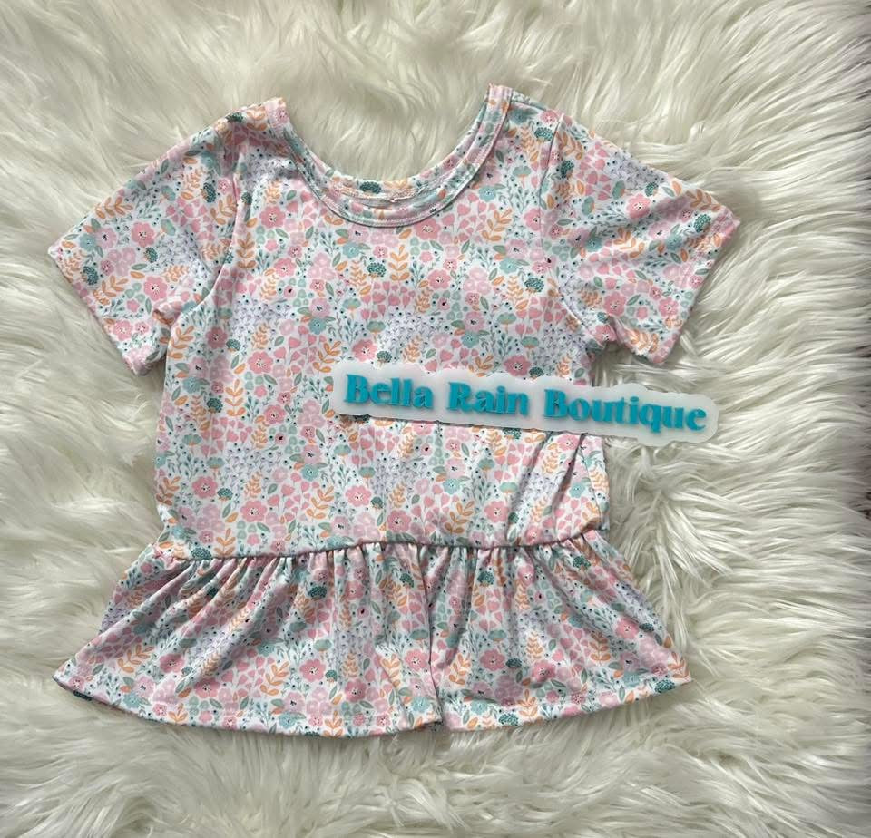 Size 6 Floral peplum- (Slight flaw In the photos)
