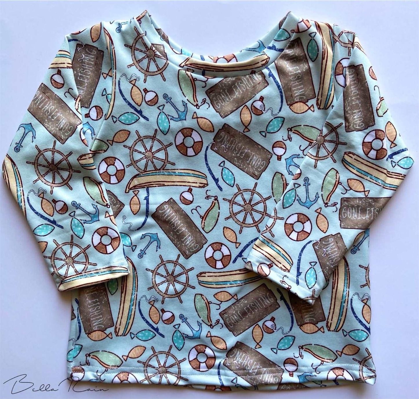 Gone Fishing Basic TeeThis fishing basic tee is the perfect for any outdoor adventure. Whether you're out on the lake or just enjoying a day in the sun, this top will keep your babe comfo
