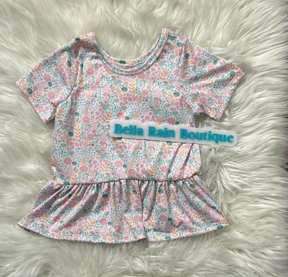 Size 6 Floral peplum- (Slight flaw In the photos)